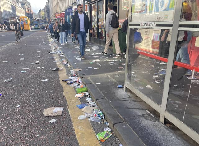 Rubbish lies strewn along Edinburgh's South Bridge (Picture: Ilona Amos)