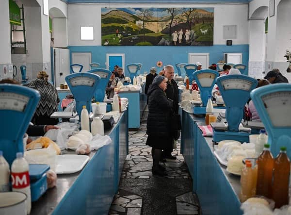 Customers at the central market in Chisinau, earlier this year. The country is suffering blackouts as a result of Russian attacks on Ukrainian infrastructure.