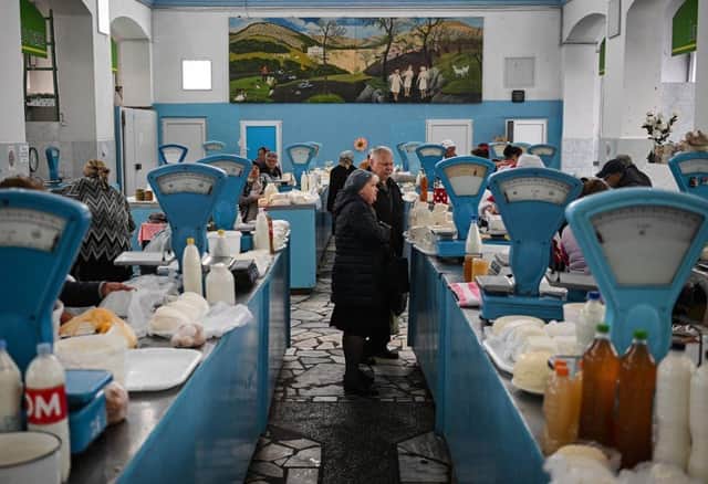 Customers at the central market in Chisinau, earlier this year. The country is suffering blackouts as a result of Russian attacks on Ukrainian infrastructure.
