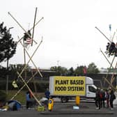 Animal rights protesters from Animal Rebellion blockade a McDonald's distribution centre in Coventry (Picture: Darren Staples/Getty Images)