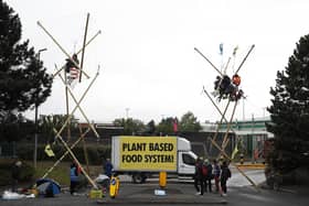 Animal rights protesters from Animal Rebellion blockade a McDonald's distribution centre in Coventry (Picture: Darren Staples/Getty Images)