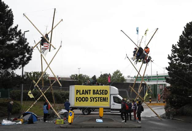 Animal rights protesters from Animal Rebellion blockade a McDonald's distribution centre in Coventry (Picture: Darren Staples/Getty Images)