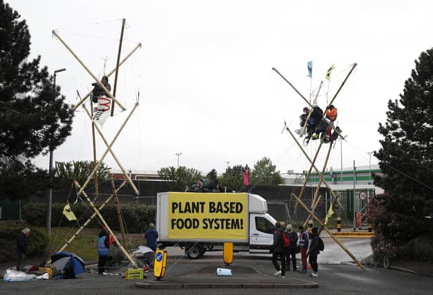 Animal rights protesters from Animal Rebellion blockade a McDonald's distribution centre in Coventry (Picture: Darren Staples/Getty Images)