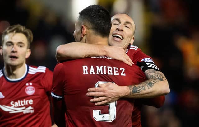 Christian Ramirez celebrates with Scott Brown after scoring to make it 4-1 for Aberdeen.