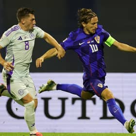 Billy Gilmour tries to get to grips with Luka Modric as Scotland fell to their latest defeat, this time against Croatia on Saturday (Photo by Srdjan Stevanovic/Getty Images)