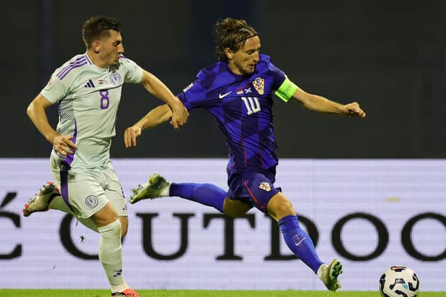 Billy Gilmour tries to get to grips with Luka Modric as Scotland fell to their latest defeat, this time against Croatia on Saturday (Photo by Srdjan Stevanovic/Getty Images)