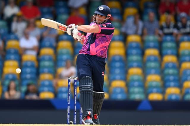 Scotland's George Munsey bats during the ICC Men's T20 Cricket World Cup match against England. (Photo by Gareth Copley/Getty Images)