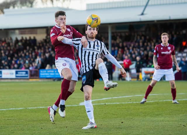 Arbroath's Michael McKenna (L) and Dunfermline's Joe Chalmers.  (Photo by Mark Scates / SNS Group)
