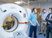 Health secretary Humza Yousaf with radiographer Steven Townsend (left) and medical director Chris McKenna (centre) in the CT suite during a visit to the Rapid Cancer Diagnostic Service (RCDS) at the NHS Fife Victoria Hospital in Kirkcaldy. Picture: Jane Barlow/PA Wire