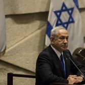 Benjamin Netanyahu speaks in the Israeli parliament as his new government is sworn in last month (Picture: Amir Levy/Getty Images)
