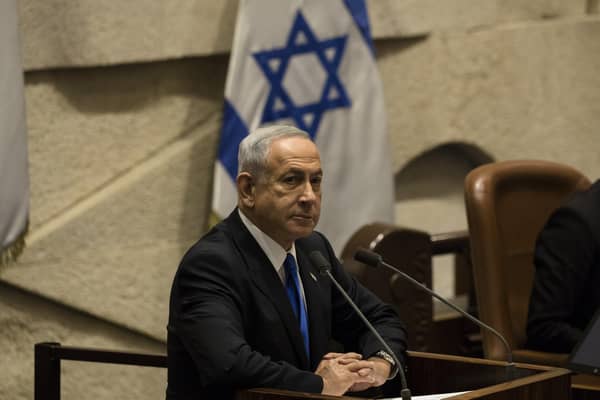 Benjamin Netanyahu speaks in the Israeli parliament as his new government is sworn in last month (Picture: Amir Levy/Getty Images)