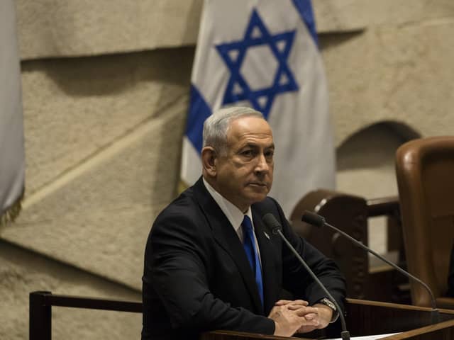 Benjamin Netanyahu speaks in the Israeli parliament as his new government is sworn in last month (Picture: Amir Levy/Getty Images)