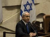Benjamin Netanyahu speaks in the Israeli parliament as his new government is sworn in last month (Picture: Amir Levy/Getty Images)
