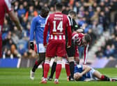 Rangers' Ryan Jack goes down with an injury after the challenge that earned St Johnstone's Nicky Clark a red card.  (Photo by Rob Casey / SNS Group)