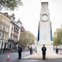 Officers from the Metropolitan Police on duty beside the Cenotaph in Whitehall, central London, ahead of marches planned for the centre of the city on Saturday - Armistice Day. Picture: Stefan Rousseau/PA Wire
