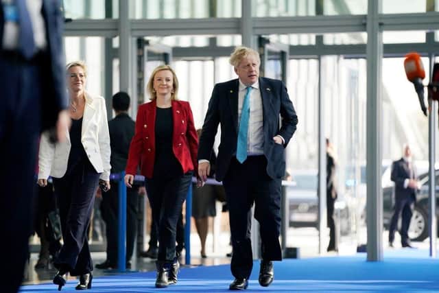Prime Minister Boris Johnson and Foreign Secretary Liz Truss must stand firm against EU negotiators (Picture: Evan VucciAFP/Getty)