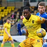 Marvin Bartley holds off St Johnstone's David Wotherspoon as Livingston succumbed to their first defeat under manager David Martindale  (Photo by Sammy Turner / SNS Group)