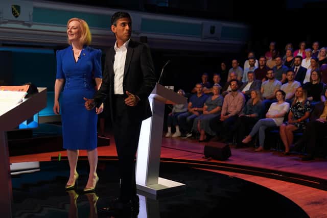 Rishi Sunak and Liz Truss before taking part in the BBC Tory leadership debate, Our Next Prime Minister, presented by Sophie Raworth, a head-to-head debate at Victoria Hall in Hanley, Stoke-on-Trent, between the Conservative party leadership candidates. Picture date: Monday July 25, 2022.