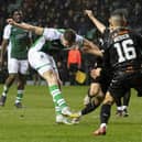 Kevin Nisbet scores an injury-time equaliser for Hibs in the 2-2 draw with Dundee United at Easter Road. (Photo by Ross Parker / SNS Group)
