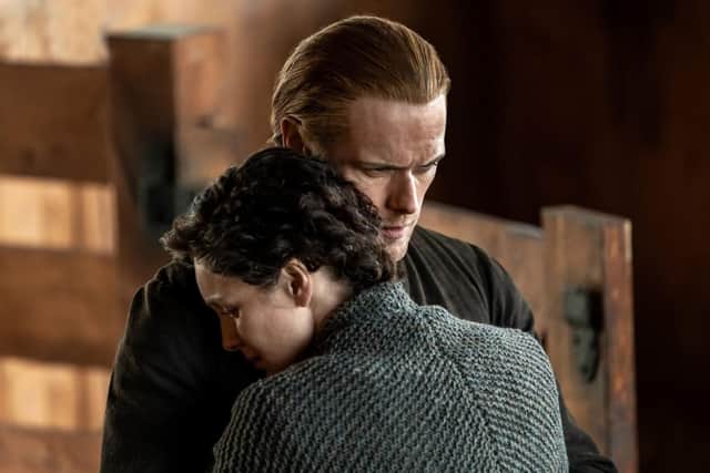 Jamie Fraser and Claire Fraser (Sam Heughan and Caitriona Balfe) in the Outlander Season 6 finale (Starz)