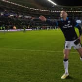 Finn Russell hands over his man of the match medal. (Photo by Ross MacDonald / SNS Group)