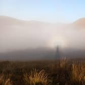 National Trust for Scotland ranger David Allsop captured the broken spectre – a rare mountaintop weather phenomenon which sees a person's shadow greatly magnified and projected onto low-lying blankets of mist and illuminated by the sun behind them – on Ben Lomond, one of the country's most popular Munros