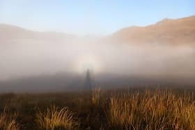 National Trust for Scotland ranger David Allsop captured the broken spectre – a rare mountaintop weather phenomenon which sees a person's shadow greatly magnified and projected onto low-lying blankets of mist and illuminated by the sun behind them – on Ben Lomond, one of the country's most popular Munros
