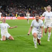 Fran Kirby of England celebrates with teammates Beth Mead and Lauren Hemp  after scoring their team's fourth goal during the UEFA Women's Euro 2022 Semi Final match between England and Sweden at Bramall Lane on July 26, 2022 in Sheffield, England. (Photo by Shaun Botterill/Getty Images)