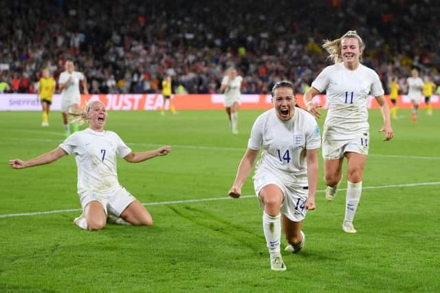 Fran Kirby of England celebrates with teammates Beth Mead and Lauren Hemp after scoring their team's fourth goal during the UEFA Women's Euro 2022 Semi Final match between England and Sweden at Bramall Lane on July 26, 2022 in Sheffield, England. (Photo by Shaun Botterill/Getty Images)