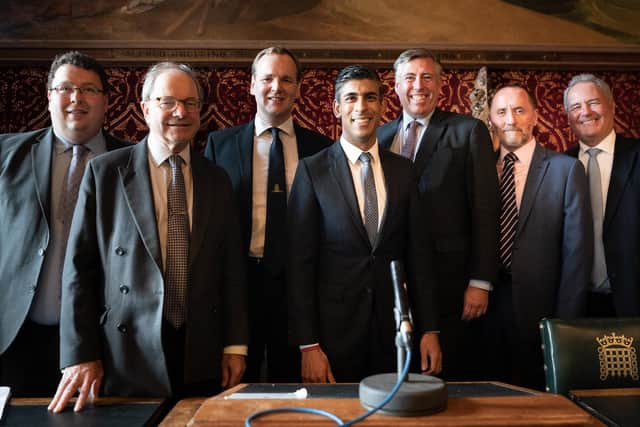 Rishi Sunak (centre) meeting with members of the 1922 Committee in the Houses of Parliament, London after it was announced he will become the new leader of the Conservative party after rival Penny Mordaunt dropped out.