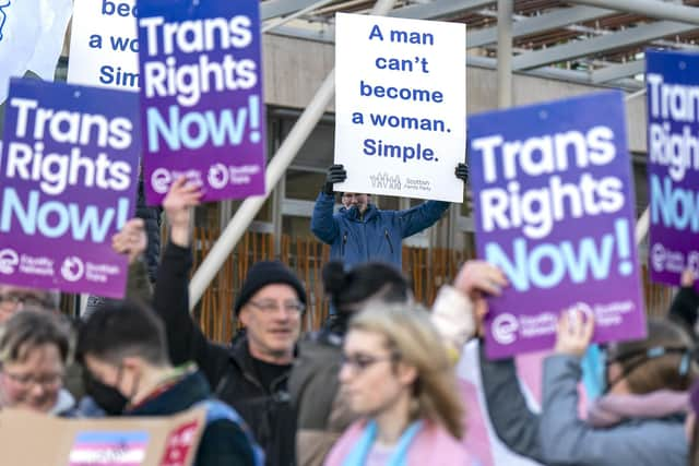 Members of the Scottish Family Party protest alongside supporters of the Gender Recognition Reform Bill (Scotland) outside the Scottish Parliament, Edinburgh, ahead of a debate on the bill.