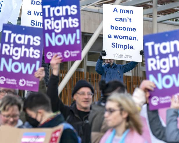 Members of the Scottish Family Party protest alongside supporters of the Gender Recognition Reform Bill (Scotland) outside the Scottish Parliament, Edinburgh, ahead of a debate on the bill.