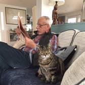 Scotsman columnist Bill Jamieson and his cat Poosie Nancie, who appears to be wondering why he never leaves the house these days