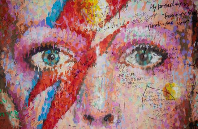 Messages written on the David Bowie mural in Brixton, south London, to mark his birthday last year (PIcture: Dominic Lipinski/PA)
