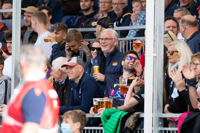 Fans enjoy a drink in the sunshine at the first match at the Edinburgh Rugby Stadium. Picture: Ross Parker/SNS