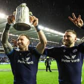 Finn Russell and Stuart Hogg saw off the threat from their young rivals to hoist the Calcutta Cup again