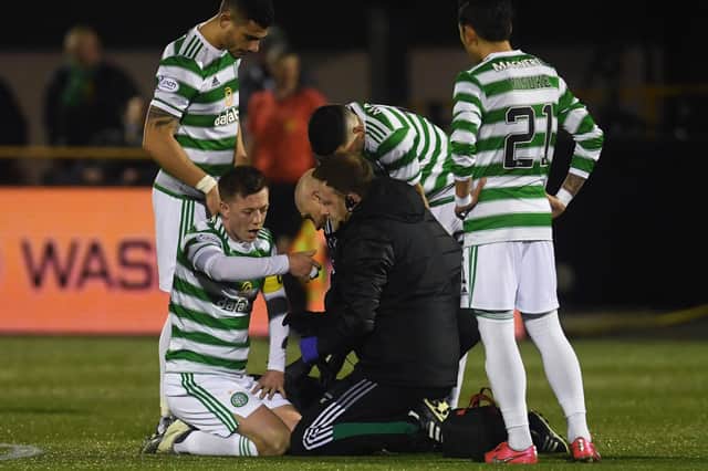 Celtic's Callum McGregor goes down with a facial injury during the Scottish Cup 4th round win over Alloa (Photo by Craig Foy / SNS Group)