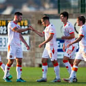 Dundee United celebrate Peter Pawlett's goal.