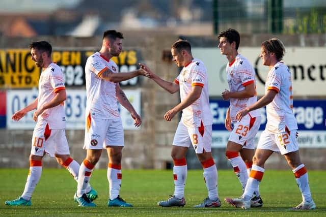 Dundee United celebrate Peter Pawlett's goal.