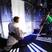 Immortalised in wax: Jedi knights Obi-Wan Kenobi, left, and Qui Gon Yin take on Darth Maul at Madame Tussauds (Picture: Stuart C Wilson/Getty Images)