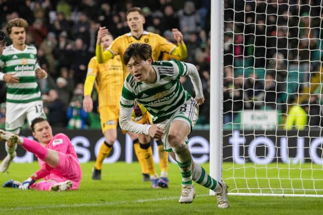 Kyogo Furuhashi celebrates after scoring what proved to be Celtic's winner against Livingston. (Photo by Craig Williamson / SNS Group)