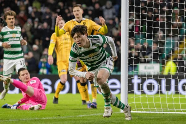 Kyogo Furuhashi celebrates after scoring what proved to be Celtic's winner against Livingston. (Photo by Craig Williamson / SNS Group)