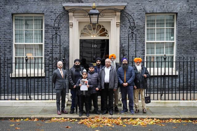 Members of the Free Jaggi Now Campaign hand in a petition to 10 Downing Street, London. Picture: PA