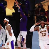 LeBron James (No 23) of the Los Angeles Lakers reacts after winning the 2020 NBA Championship over the Miami Heat in Game Six of the 2020 NBA Finals.