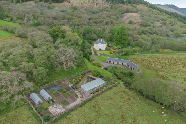Aerial view of house and grounds.