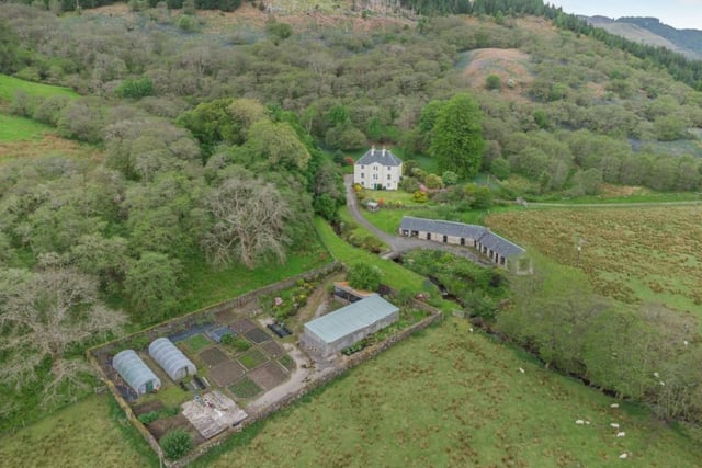Aerial view of house and grounds.