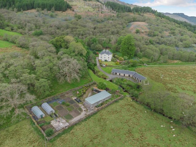 Aerial view of house and grounds.