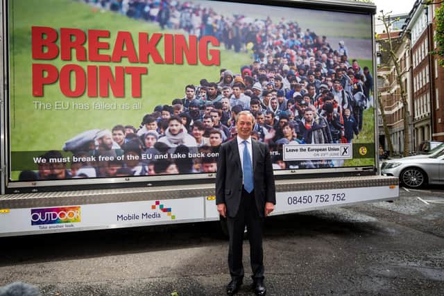 Nigel Farage poses with a highly controversial Ukip campaign poster ahead of the 2016 Brexit referendum (Picture: Jack Taylor/Getty Images)