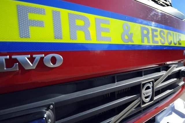 Fire crews are tackling a “large blaze” within a recycling centre near Dundee airport.