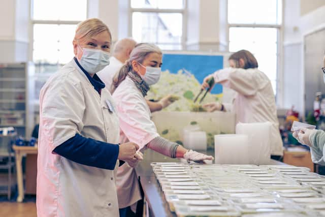 Volunteers and staff at Empty Kitchens Full Hearts, a charity set up during the first Covid-19 lockdown in 2020, prepare meals for delivery to people in need around Edinburgh. Picture: Scott Barron